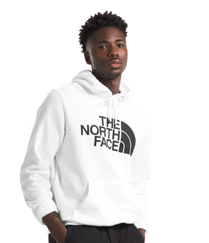A man in a white hooded sweatshirt with "THE NORTH FACE" text.