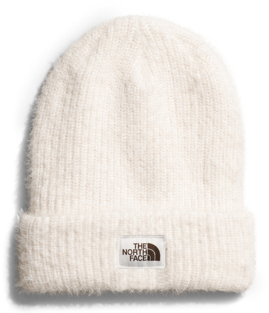 White knit beanie with a folded brim and a square logo patch.