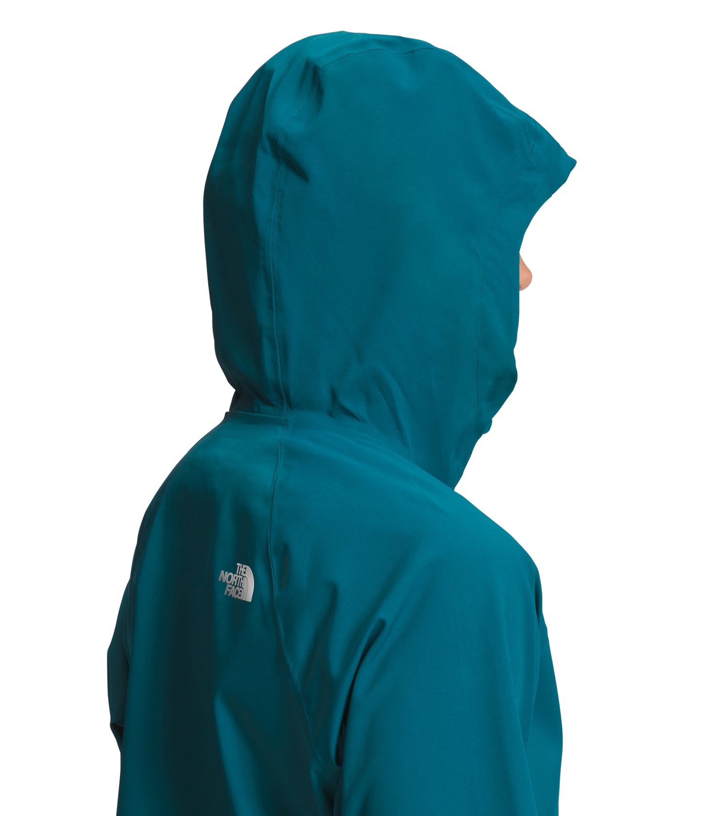 Close-up view of the back and hood of a teal jacket featuring a white logo.