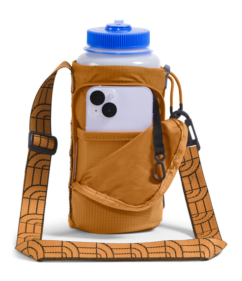 A yellow water bottle sling with a blue cap and a phone in the front pocket, with an adjustable shoulder strap with a black geometric pattern.