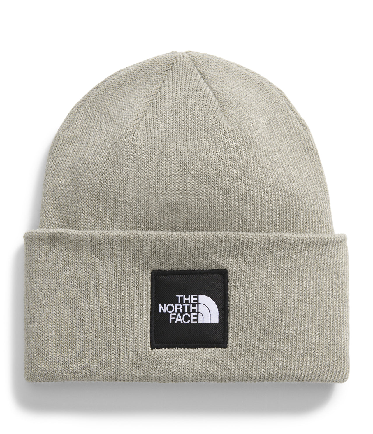 Grey knit beanie with a black square patch that says "THE NORTH FACE" in white text above a white logo.