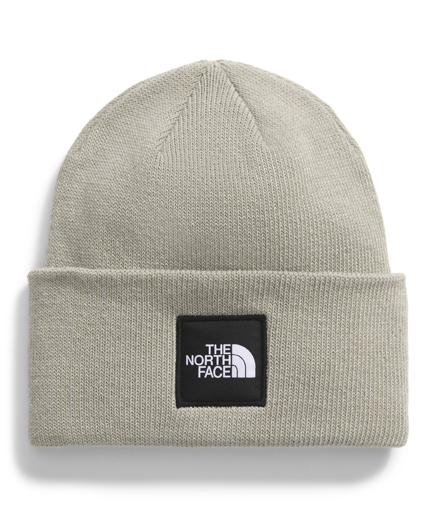 Grey knit beanie with a black square patch that says "THE NORTH FACE" in white text above a white logo.