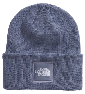 Knit beanie with a square patch that says "THE NORTH FACE" in white letters.