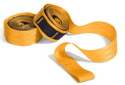 Three rolled orange fabric bands with velcro closures.