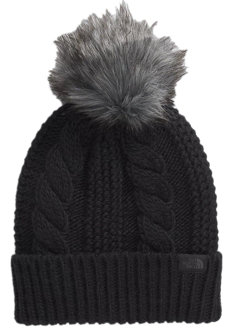 Black knit hat with cable pattern and faux fur pom.