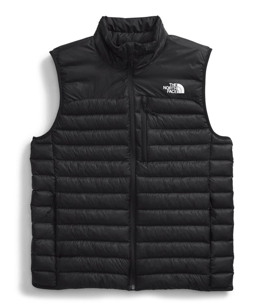 A black down-filled vest with a logo on the upper right chest.