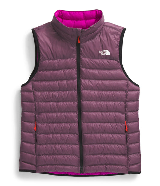 Purple quilted vest with a white logo on the chest and a pink interior.