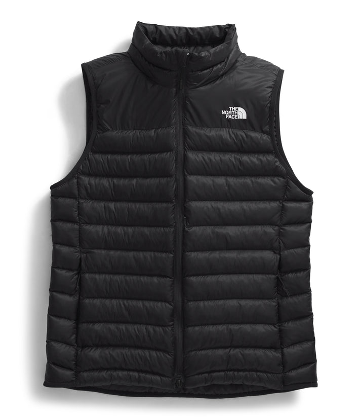 Black, quilted, down filled vest with a high collar and a white logo on the upper right.