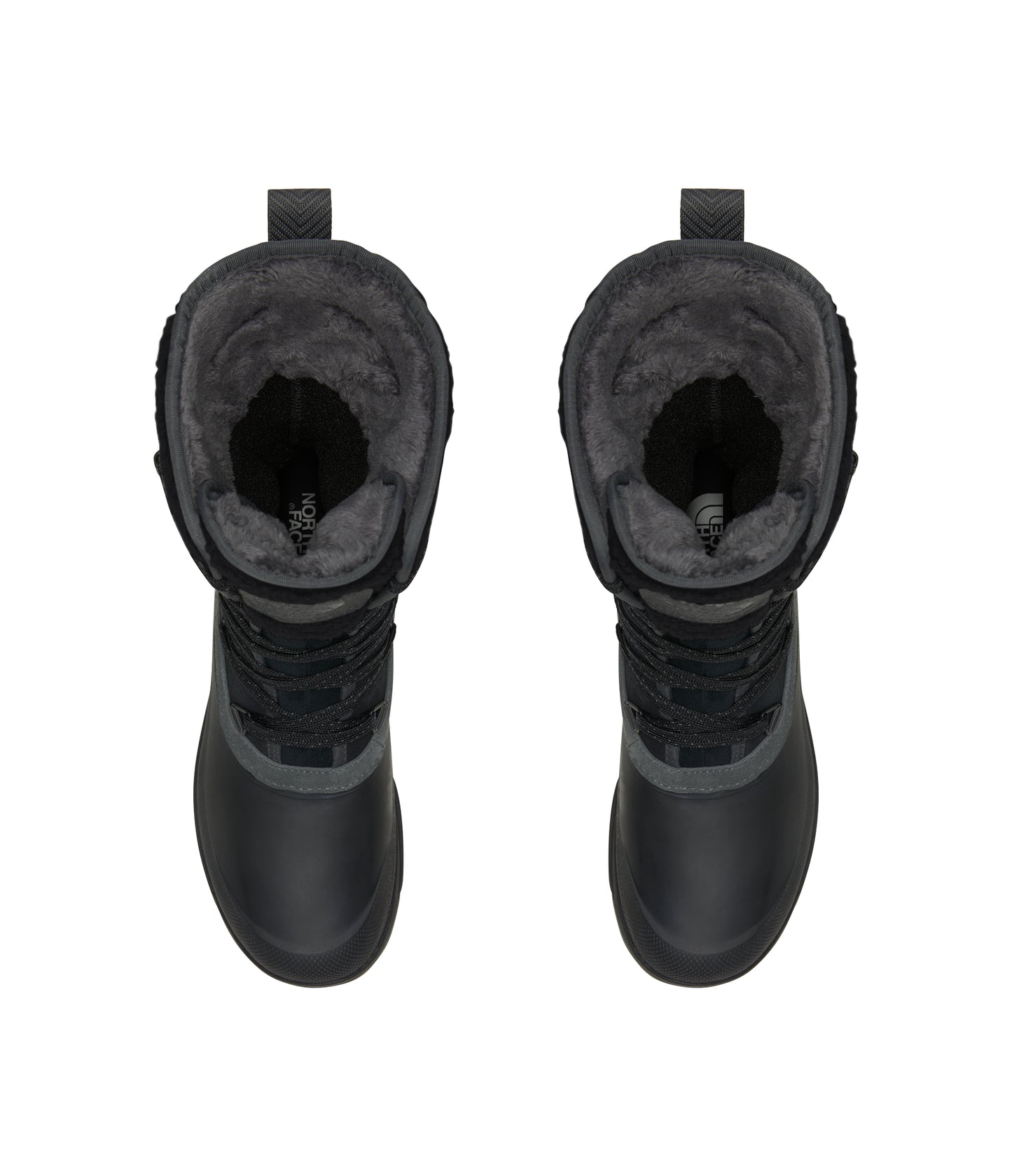 Overhead view of two black winter boots with faux fur lining.