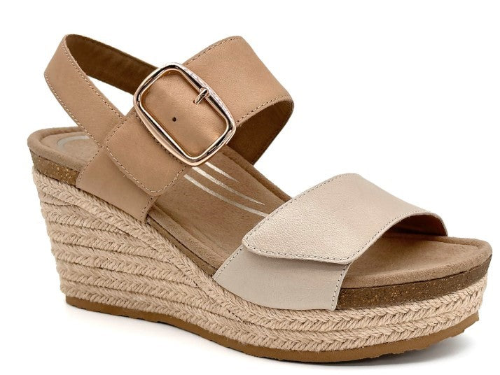 Wedge sandal with beige ankle strap, buckle, and toe strap, plus a rope-wrapped wedge heel.