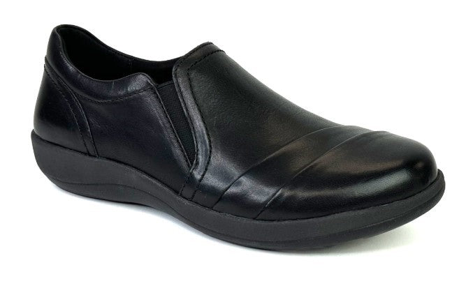 Black leather slip-on shoe with a low heel.