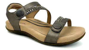 Metallic gray sandal with adjustable straps, decorative silver studs and button closures.