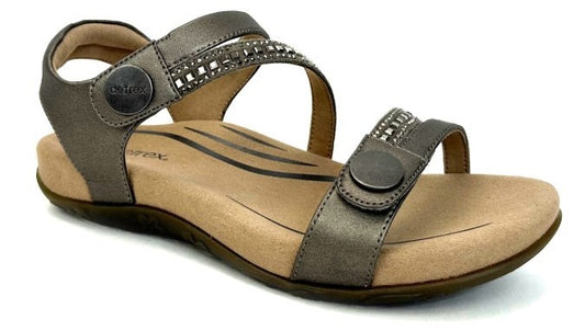 Metallic gray sandal with adjustable straps, decorative silver studs and button closures.