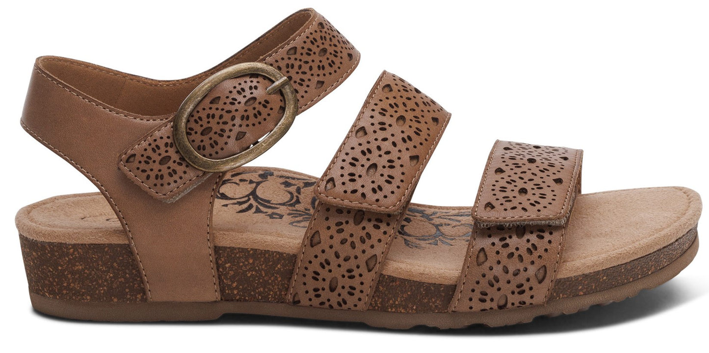 Tan sandal with two velcro straps and an ankle strap.