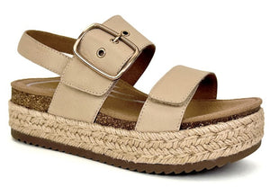 Espadrille flatform sandal with beige straps and buckle.