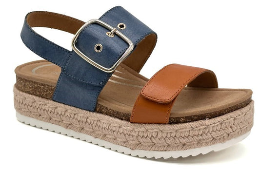 Platform sandal with blue buckled ankle strap and brown toe strap, on a jute-wrapped platform.