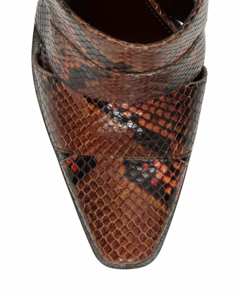 Close-up view of pointy-toed shoe with snakeskin texture in brown, orange, and black.