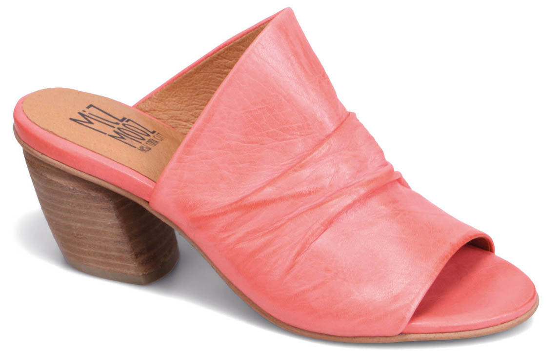 Pink leather open toe mule with a chunky heel.