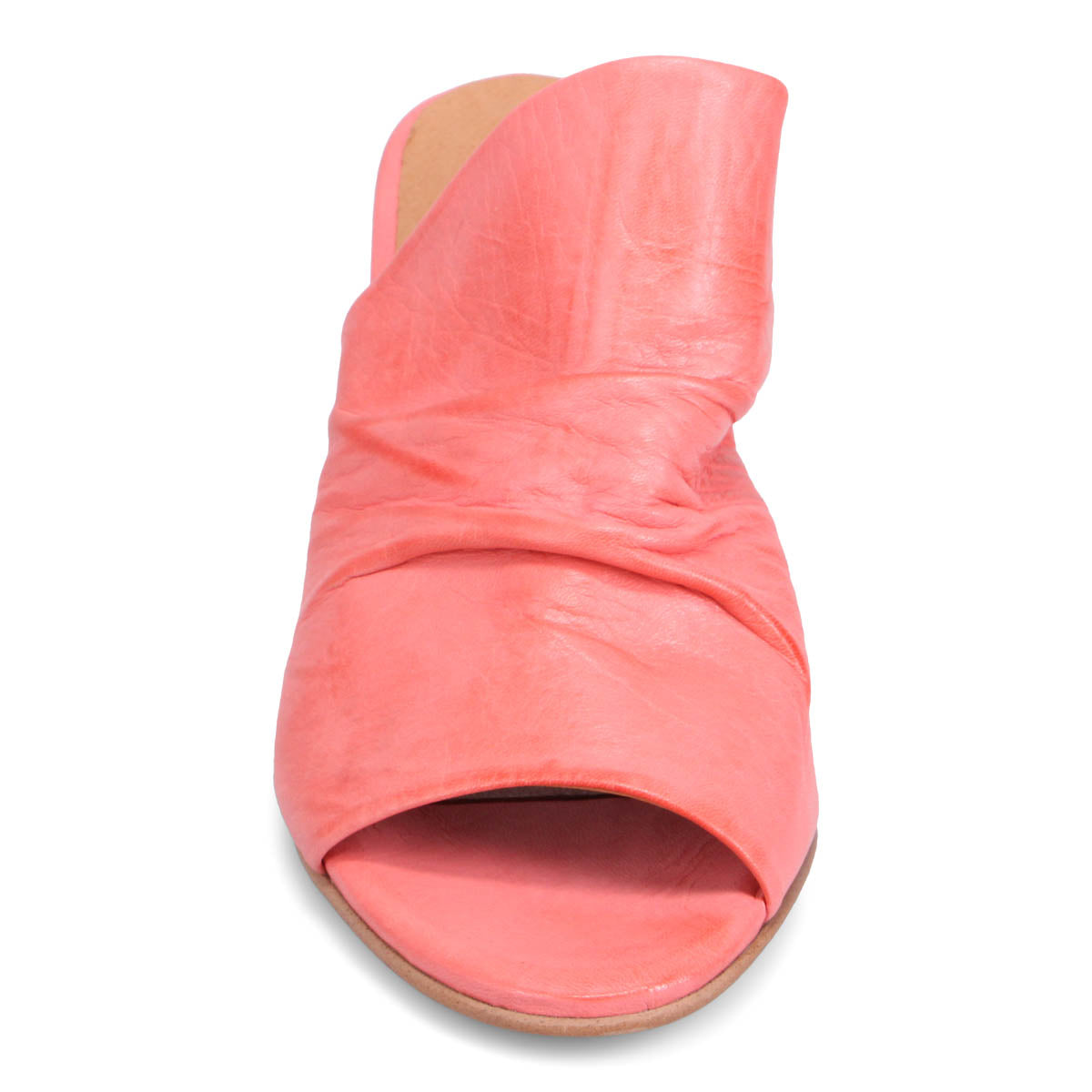 Front view of a coral-colored leather sandal with a thick heel and open toe.