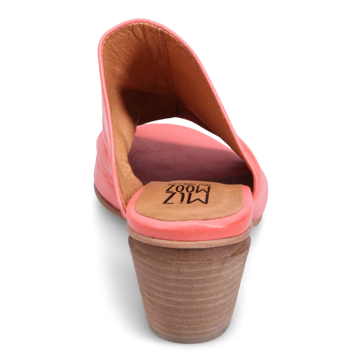 Back view of a pink leather mule with a light brown heel and insole label showing the text MIZ MOOZ.