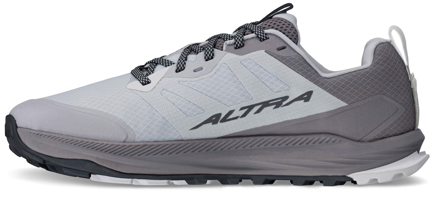 A light grey Altra running shoe with dark grey accents, a thick grey midsole, and a patterned treaded outsole, shown from the side.