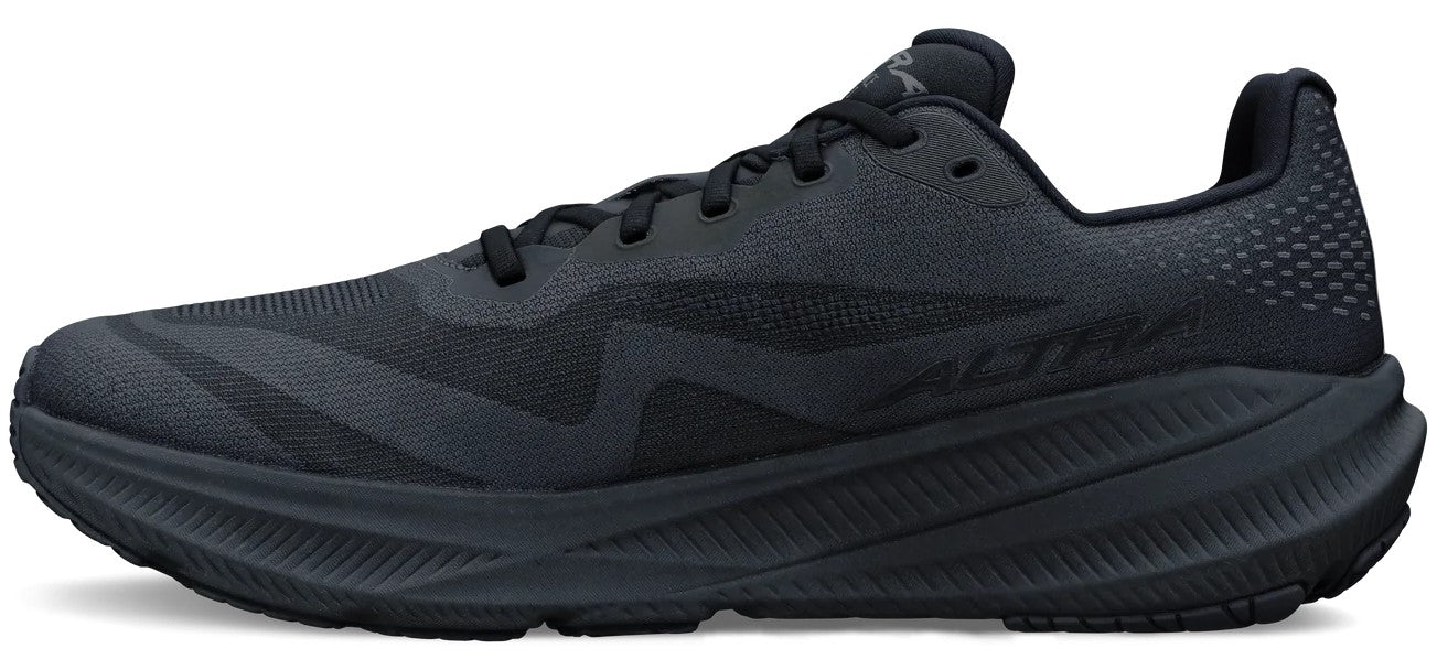 A black Altra running shoe shown from the side with a mesh upper, thick cushioned midsole, and black laces.