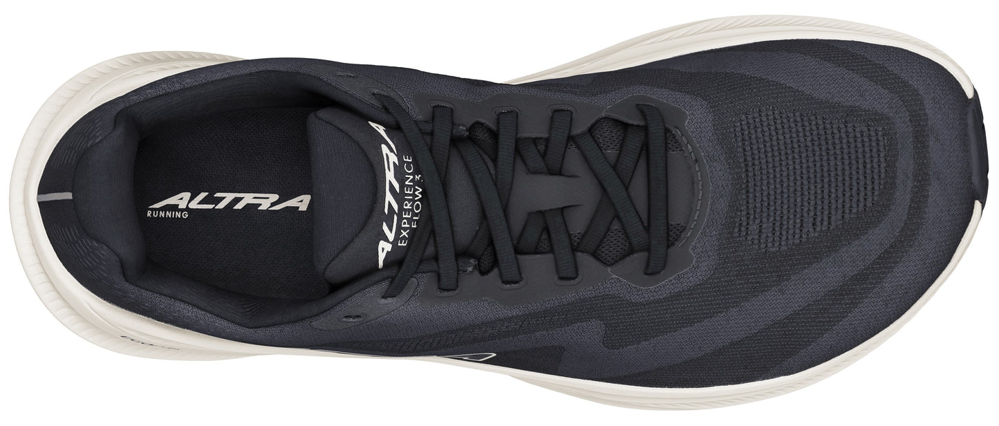 Top view of running shoe, black with wavy lines, black laces, and white sole.