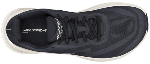 Top view of running shoe, black with wavy lines, black laces, and white sole.