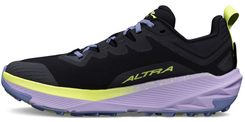 A side view of a black sneaker with light purple accents and a yellow stripe.