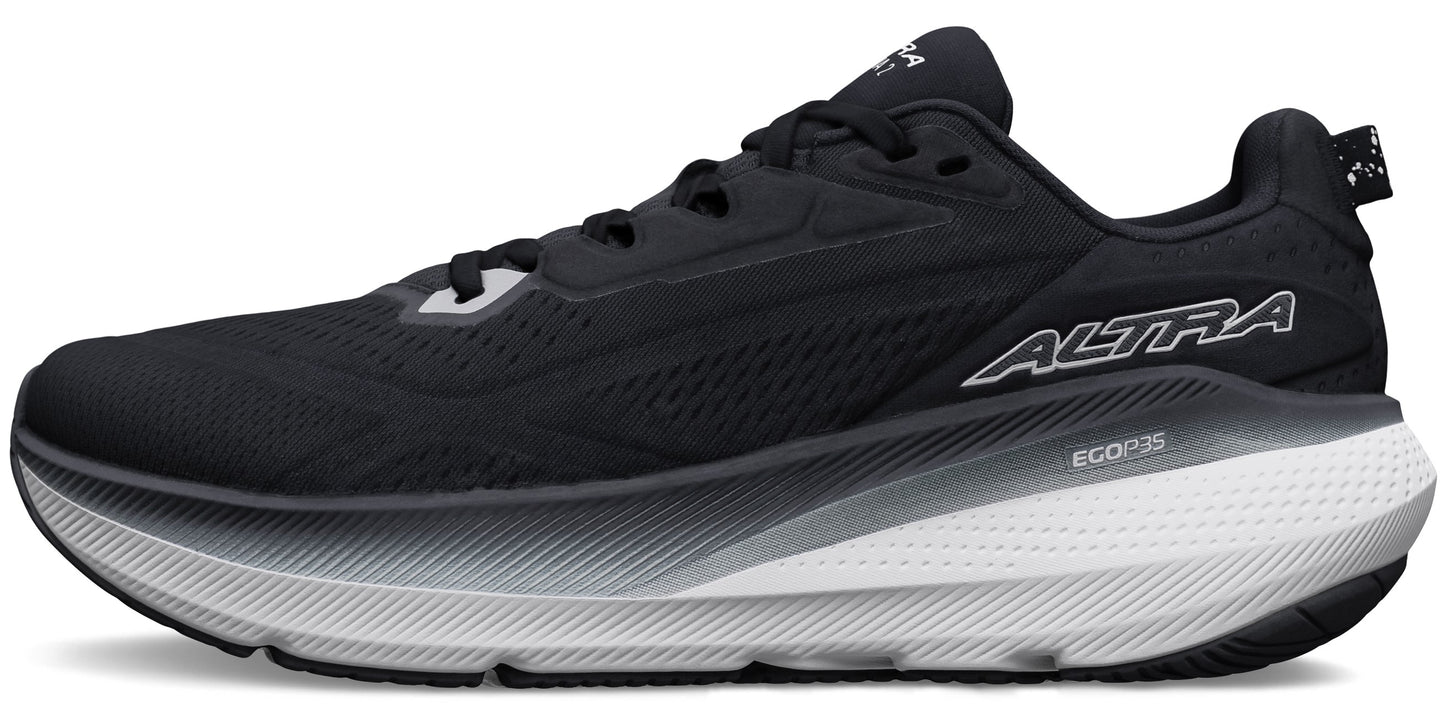 A black running shoe with a thick white sole and the word "ALTRA" printed on the side.