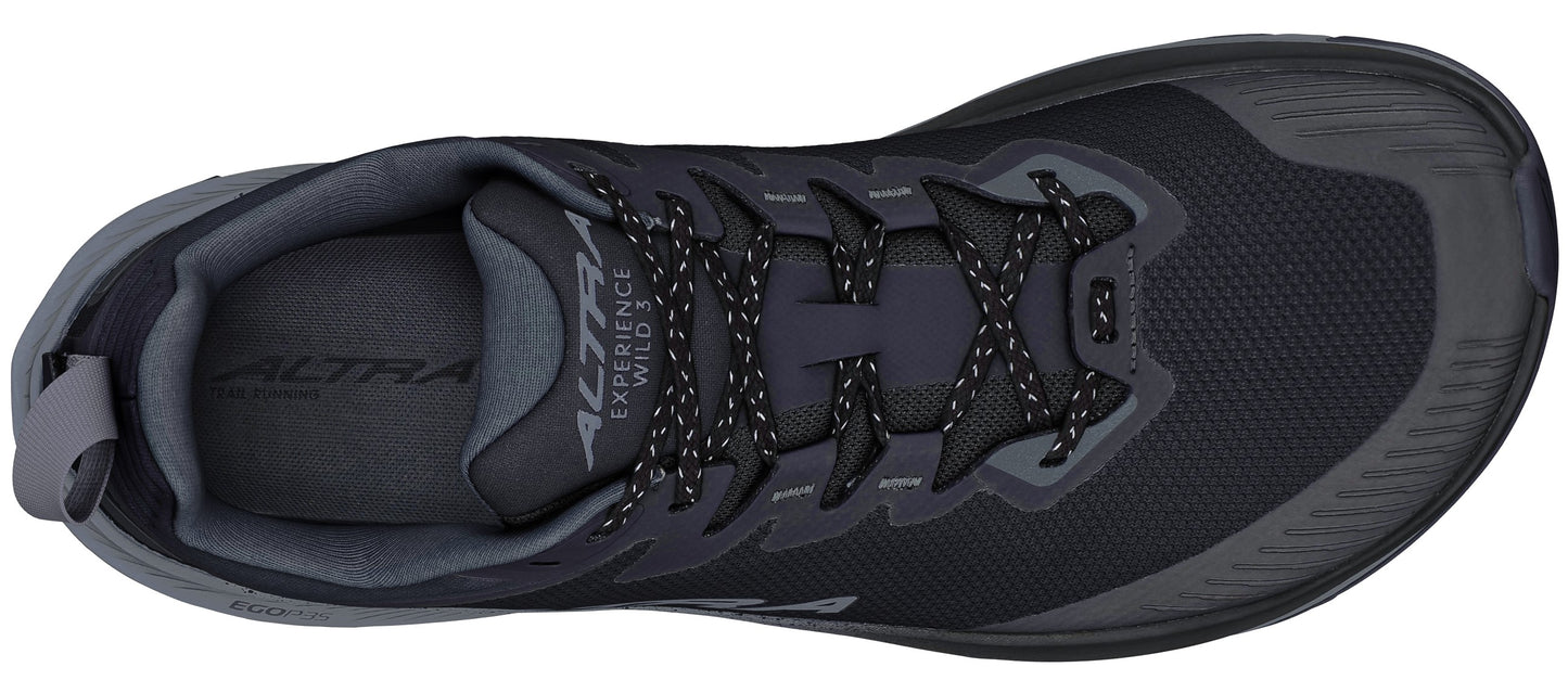Overhead view of a black running shoe with gray accents and patterned laces.