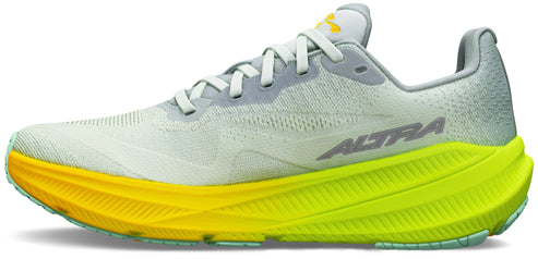 A running shoe with a yellow and green sole.