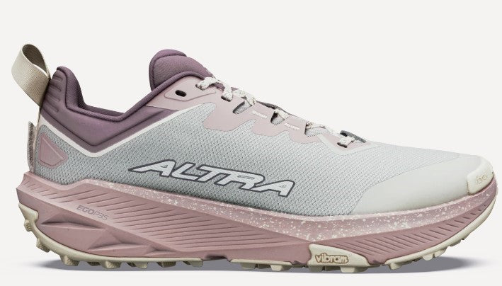 A light grey, low-top trail running shoe with a mauve-colored heel collar, tongue, and thick, speckled midsole, featuring the word ALTRA in black on the side and a Vibram logo on the sole.