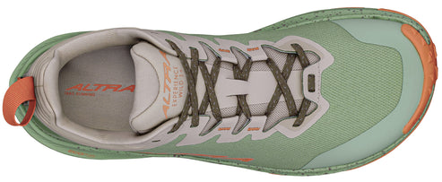 A shoe, top view, with light green front, light gray laces and tongue, and orange accents on toe and heel pull.