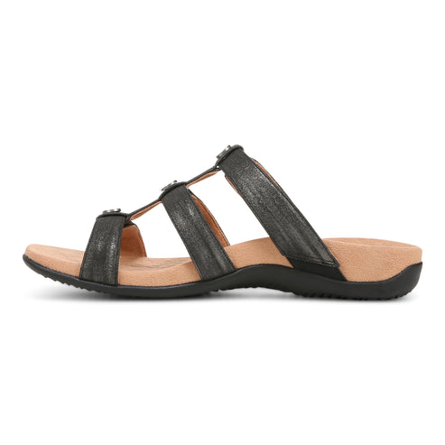 Black sandal with three straps and embellishments.