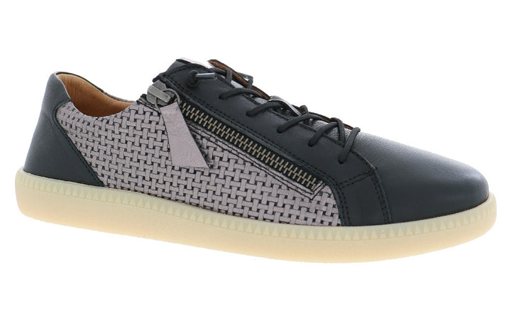 A low-top athletic shoe featuring a black leather toe and heel, a light gray woven textile midsection, a zippered outer, and a beige sole.