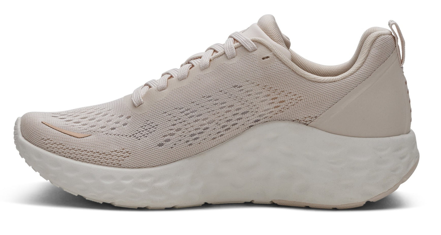 A beige athletic shoe with white textured sole.