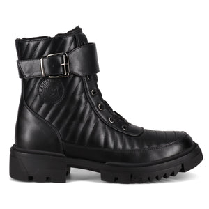 Black ankle-high quilted boot with buckle strap and lug sole.