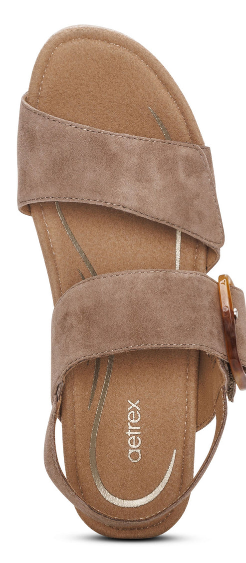 Taupe sandal with two suede straps and buckle.