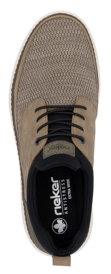 top-down view of a tan shoe with black laces and a white sole. The insole features the text "rieker ANTISTRESS EXTRA WIDE".