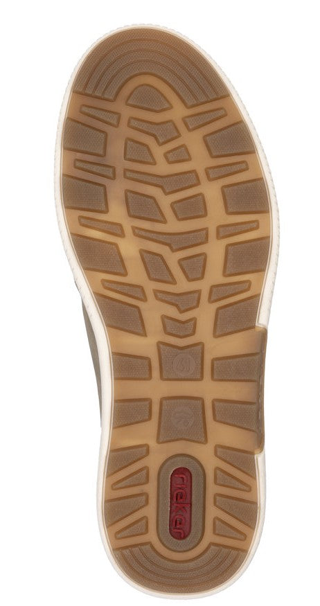 Shoe sole with brown tread and white edges.