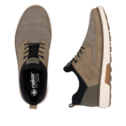 Pair of khaki athletic shoes with black laces; one shoe faces forward and the other shoe shows its side profile; the insole of the shoe facing forward says, "Rieker ANTISTRESS EXTRA WEIDE".