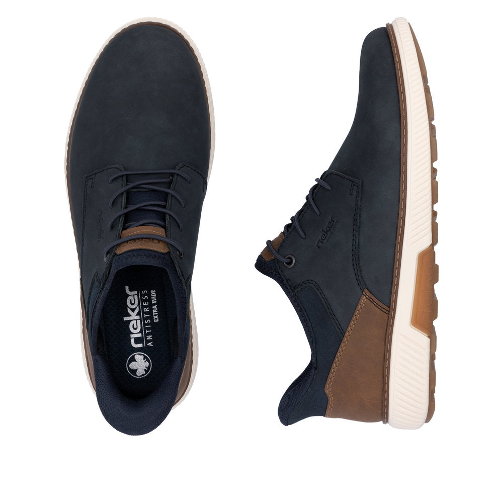 Two low-cut shoes; navy blue, tan heel, lace-up.