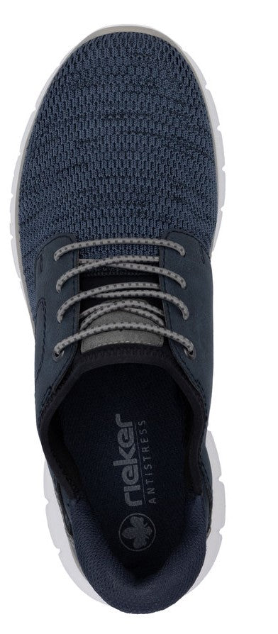 A top-down view of a laced athletic shoe with a mesh upper and a cushioned insole that has "rieker ANTISTRESS" on it.
