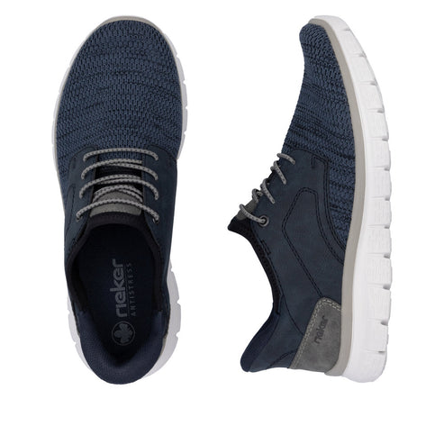 Pair of navy blue athletic shoes with gray laces and white soles.