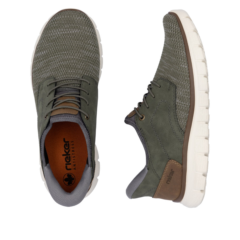 Pair of casual green shoes with white soles. The left shoe shows the insole and upper while the right shoe is shown in profile.