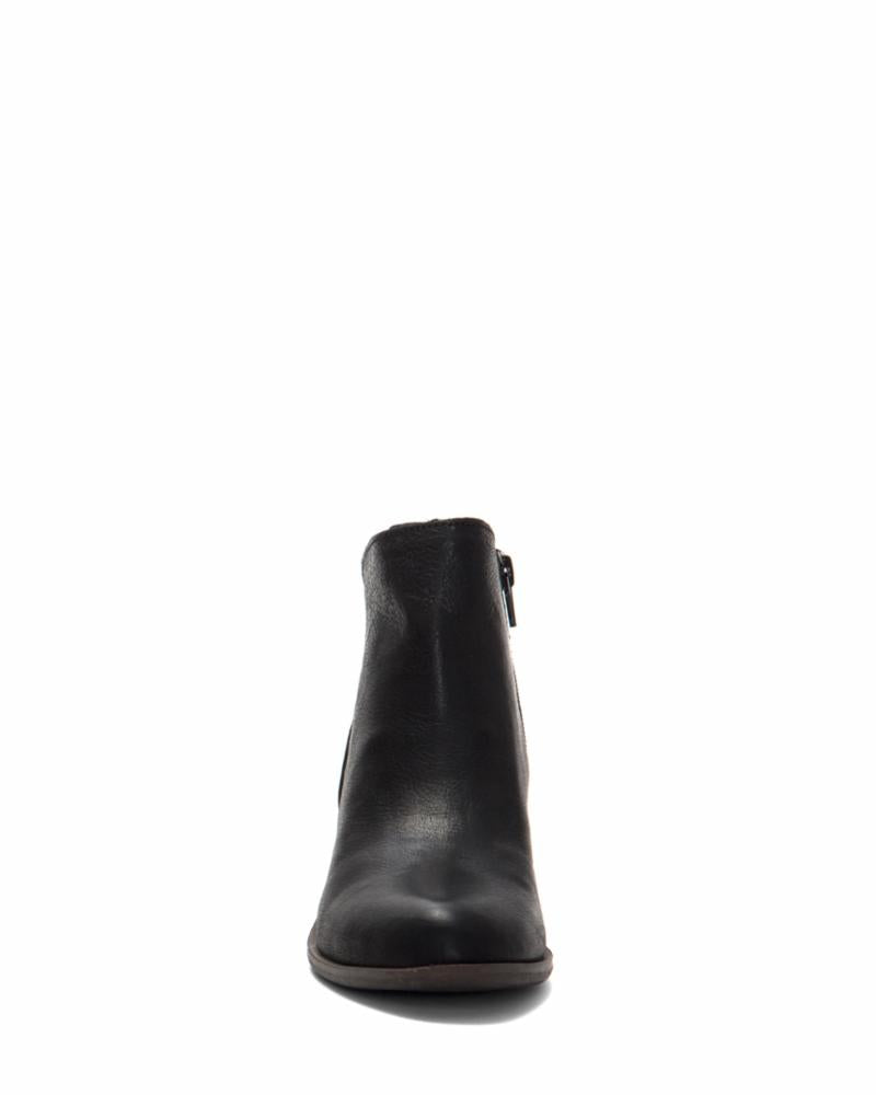 Front view of a black ankle boot with a side zipper.