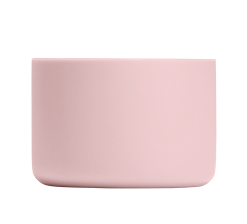 Rectangular blush-colored container.