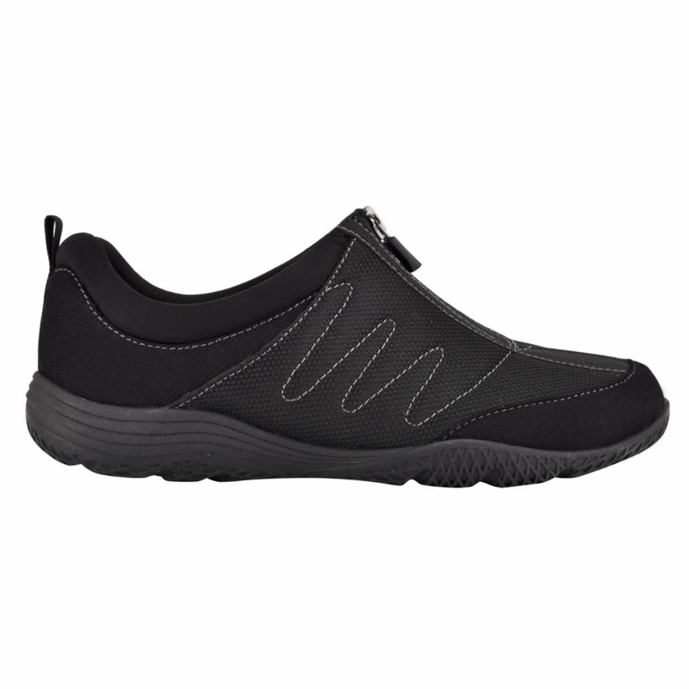 Slip-on casual shoe with zipper and zig zag stitching.