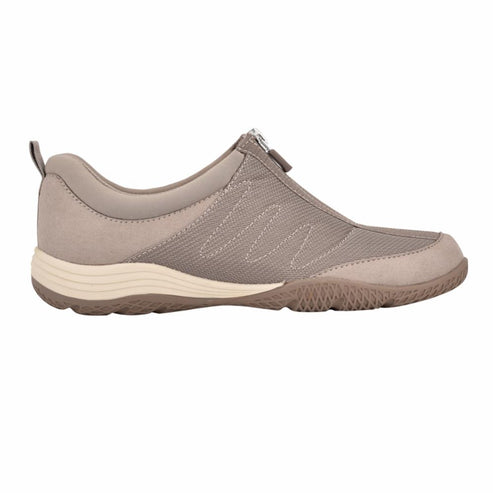 Taupe slip-on shoe with a front zipper and a patterned sole.